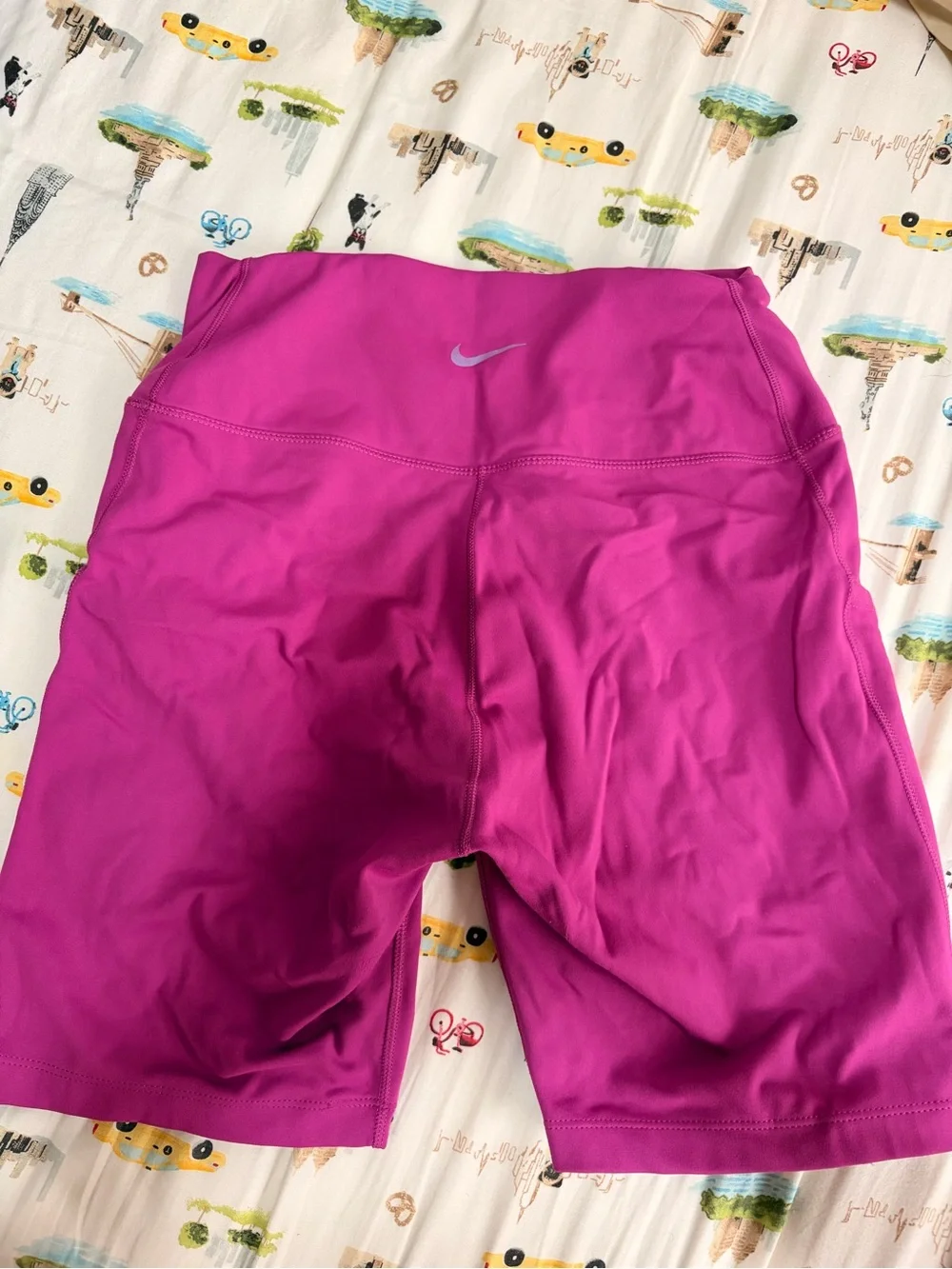 Nike Women's Magenta High-Rise Bike Shorts with Pockets and Reflective Swoosh